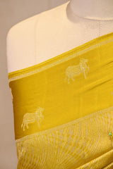Light Green Viscose Saree with Golden Wave Texture And Pichwai Border