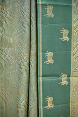 Rama Green Viscose Saree with Golden Wave Texture And Pichwai Border