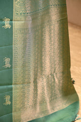 Rama Green Viscose Saree with Golden Wave Texture And Pichwai Border
