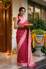 Women inRani Pink Semi-satin Saree with Gold Zari Floral Jaal
