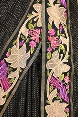 Black Semi Tusser Saree with Zari stripes and Floral Embroidered Border
