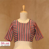 Stripe printed blouse on a mannequin with a promotional discount label against a beige background