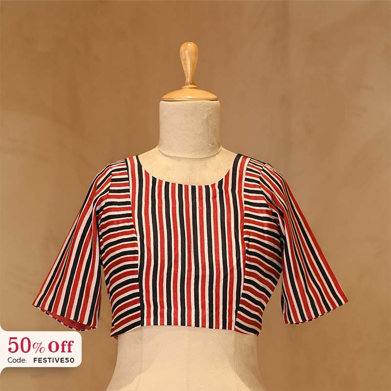 Stripe printed blouse on a mannequin with a promotional discount label against a beige background