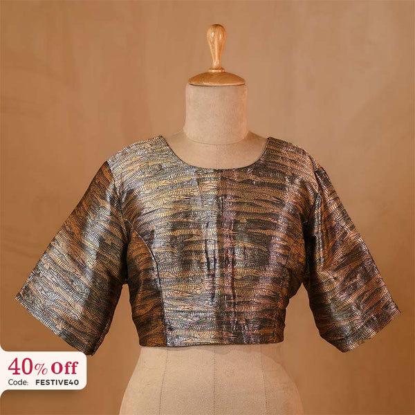 Brocade blouse on a mannequin with a promotional text Diwali sale offer on blouses up to 50%