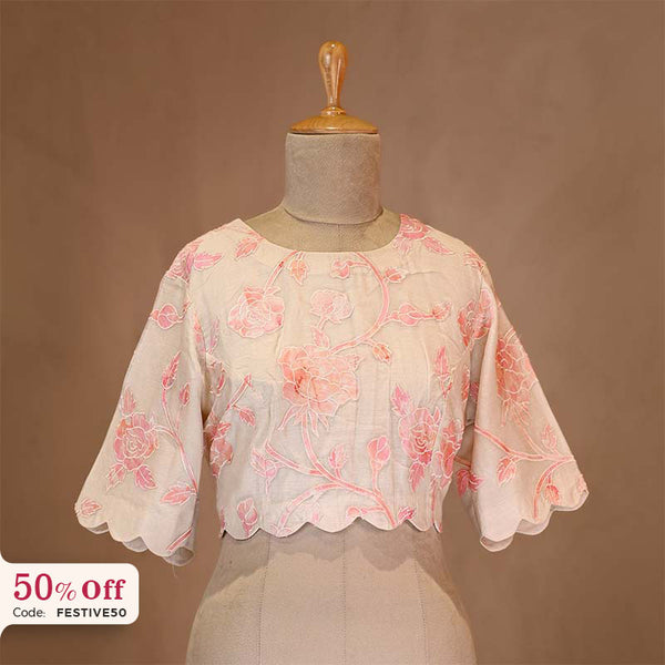 Floral blouse on a mannequin with a promotional text Diwali sale offer on blouses up to 50%