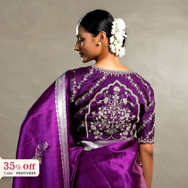 A woman wearing a purple Charbagh Blouse with intricate silver embroidery, with a promotional text Diwali sale offer on blouses up to 50% 