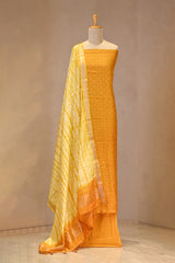 Yellow Semi Silk Unstitched Suit Set with Zari Butis