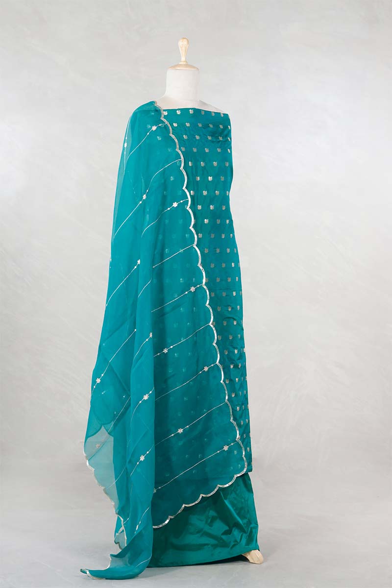 Rama Green Katan Silk Salwar Suit with with mayur motif