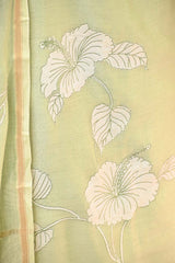 Pastel Green Mulmul Cotton Suit Set with Hibiscus Applique Kurta