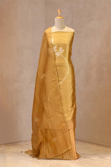 tie and dye Matsya (fish) motifs with Aari embroidery on a yellow Chiniya silk unstitched suit set, paired with a tie-dye scalloped organza dupatta.