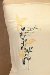 Off-White Mulmul Suit Set With Mustard Yellow Floral Embroidery