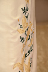 Off-White Mulmul Suit Set With Mustard Yellow Floral Embroidery