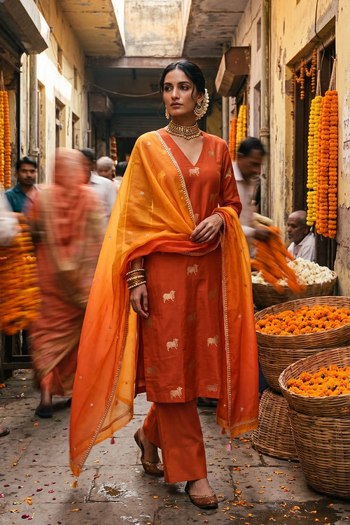 Orange Chiniya Silk Salwar Suit with Pichwai Motifs