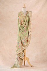 Dummy wearing sage green Banarasi Khaddi Silk Dupatta showing crushed Bandhej texture and multi-colored Meenakari parrot motifs with antique gold zari border.
