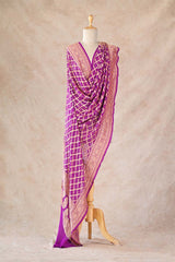 Magenta Georgette Khaddi Dupatta showing fine gold zari criss-cross pattern, Bandhani tie-dye motifs, and broad floral zari border.