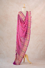 Rani Pink Georgette Dupatta showing gold zari Gharchola checks, floral detailing, and contrast border with intricate zari floral motifs.