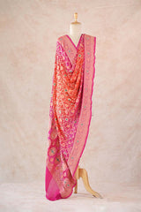Orange and pink Georgette Silk Dupatta showing woven Meenakari floral jaal, authentic Bandhani tie-dye texture, and contrast Meenakari border.