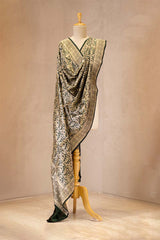 Dupatta draped over a mannequin against a plain background