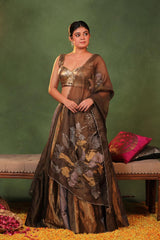 Metallic tissue silk kalidar lehenga in bronze and antique gold shades with zardozi waistband, bustier blouse, and embroidered organza dupatta