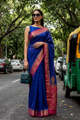 Women in Purple And Pink Chanderi Silk Saree with Antique Zari Border