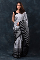 Women in Grey & Black Striped Handwoven Satin Silk Saree At Chinaya Banaras 