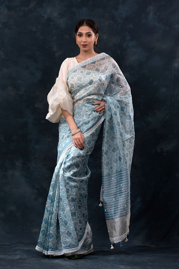Women in Sparkling Blue Geometrical Printed Embellished Tissue Silk Saree At Chinaya Banaras 