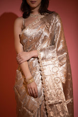 Women in Beige Gold Embellished Tissue Silk Saree at Chinaya Banaras