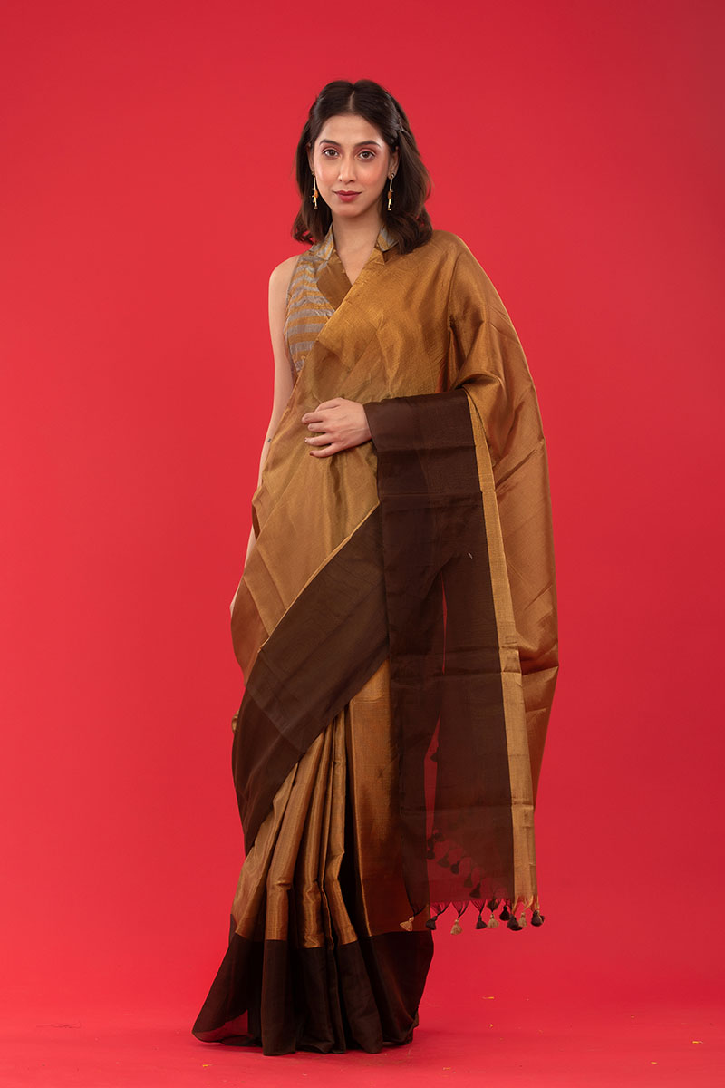 Indian women in Golden Tissue Silk Saree at Chinaya Banaras