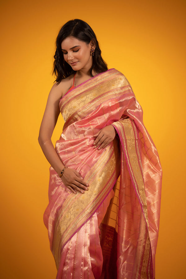 Women in  Pink Handwoven Tissue Silk Saree at Chinaya Banaras