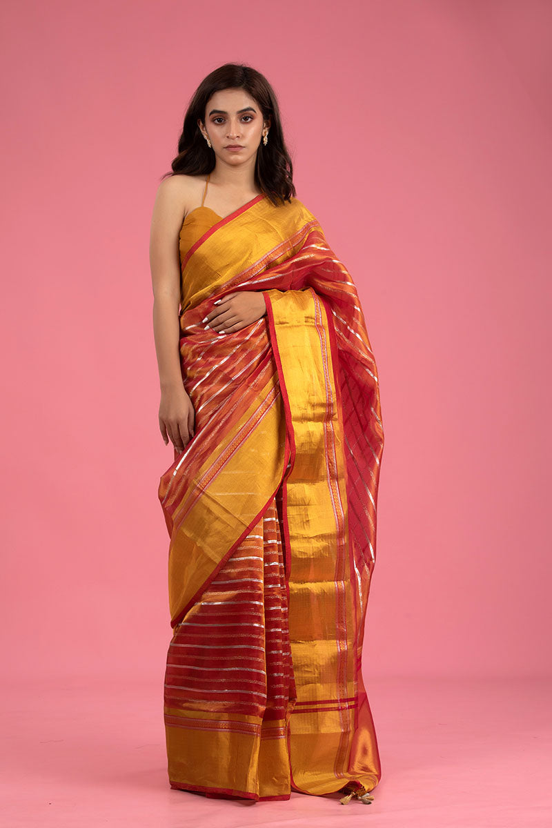 Women in  Red Woven Tissue Silk Saree At Chinaya Banaras