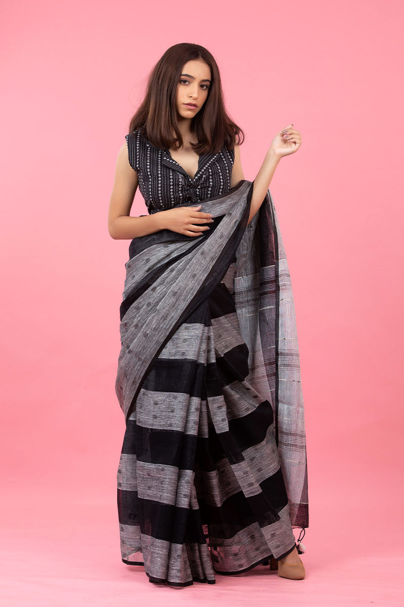 Women In Black Striped Woven Linen Saree At Chinaya Banaras