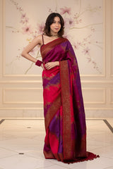 A woman in pink and purple Banarasi raw silk saree