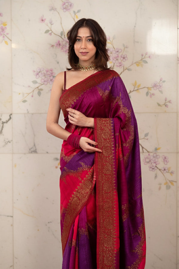 A woman in pink and purple Banarasi raw silk saree