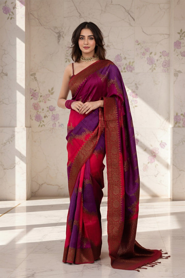 A woman in pink and purple Banarasi raw silk saree