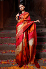 Women In Orange Red Handwoven Raw Silk Saree At Chinaya Banaras