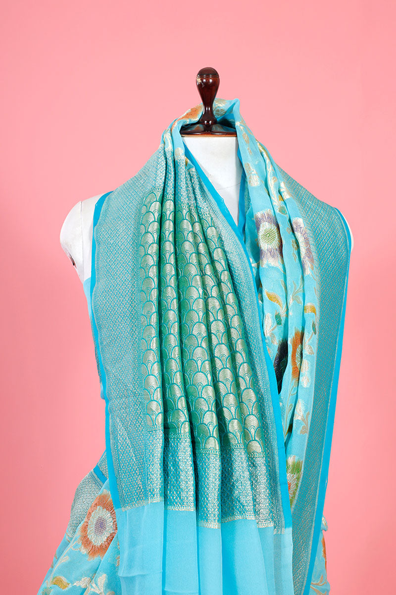 Sky Blue Floral Jaal Handwoven Georgette Khaddi Silk Saree