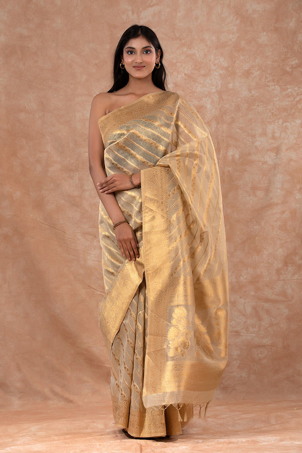 Women In Glittery Gold Woven Banarasi Cotton Saree At Chinaya Banaras