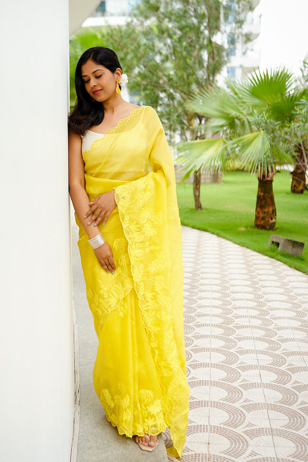 Women In Yellow Embellished Organza Silk Saree At Chinaya Banaras