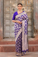 Indian women draped Navy Blue Handwoven Banarasi Silk Saree by Chinaya Banaras
