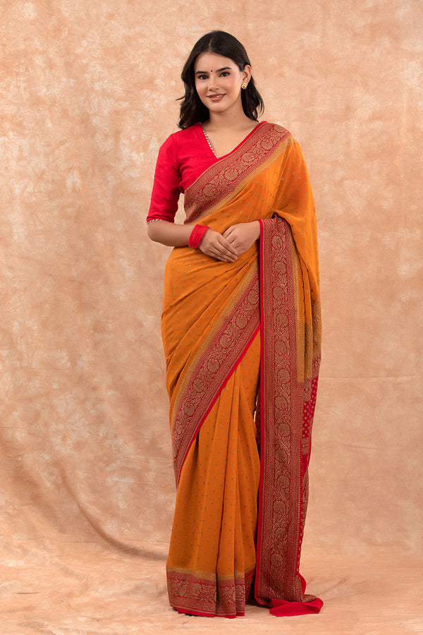 Woman In Mustard Yellow Handwoven Georgette Khaddi Silk Saree At Chinaya Banaras