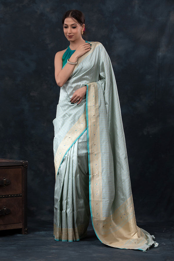 Women In Baby Blue Handwoven Banarasi Silk Saree At Chinaya Banaras 