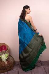 Women in Blue Raw Silk Saree at Chinaya Banaras