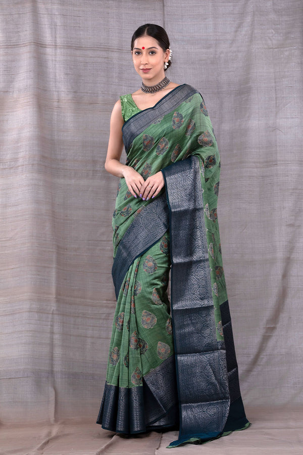 Women In Emerald Green Woven Chanderi Silk Saree At Chinaya Banaras 