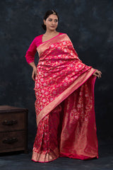 Women in Deep Pink Floral Jaal Handwoven Banarasi Silk Saree At Chinaya Banaras 