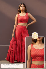 Woman wearing a red Banarasi silk blouse and sharara outfit with a close-up inset details