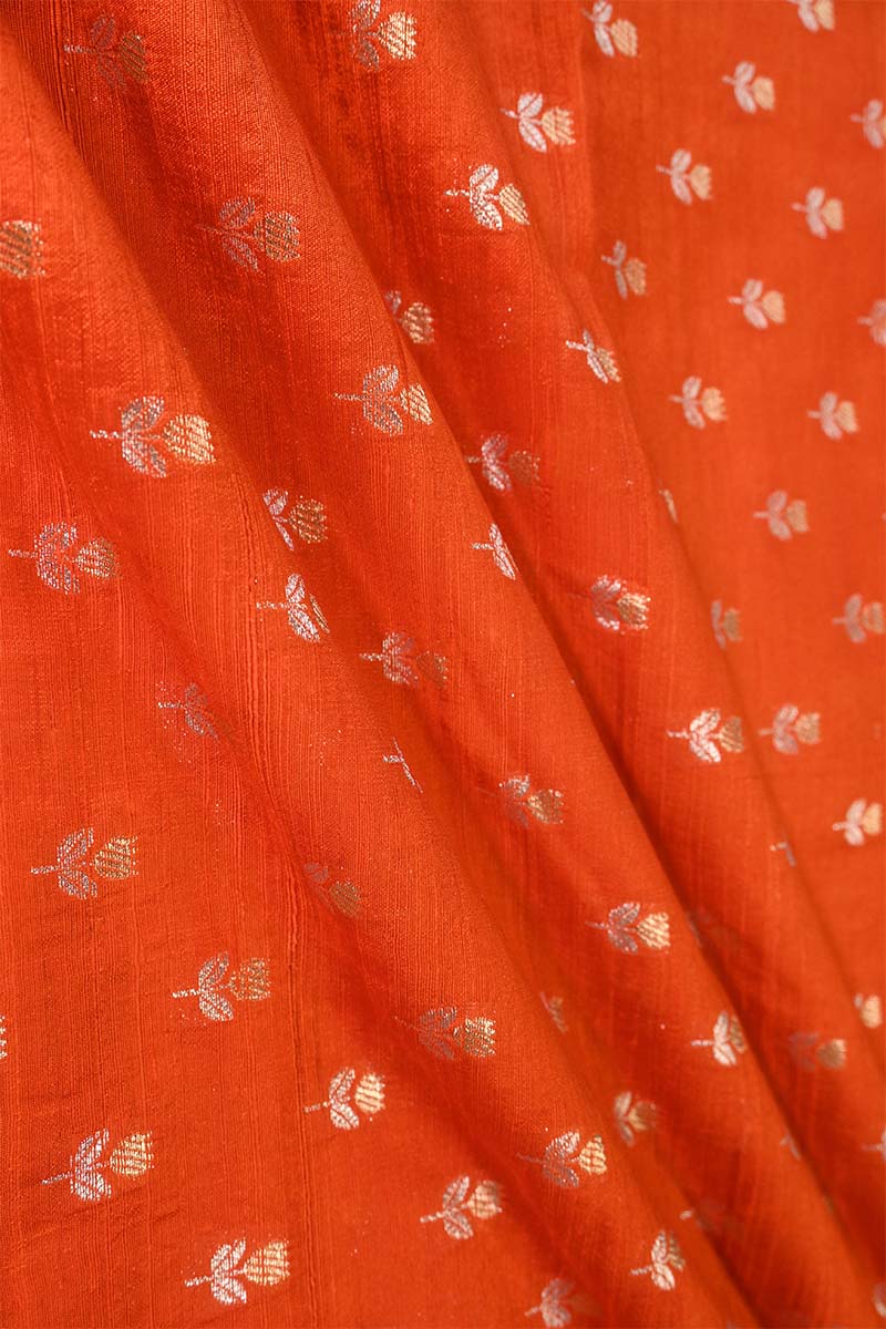 Orange Pure Raw Silk Fabric with Gold and Silver Zari Motifs