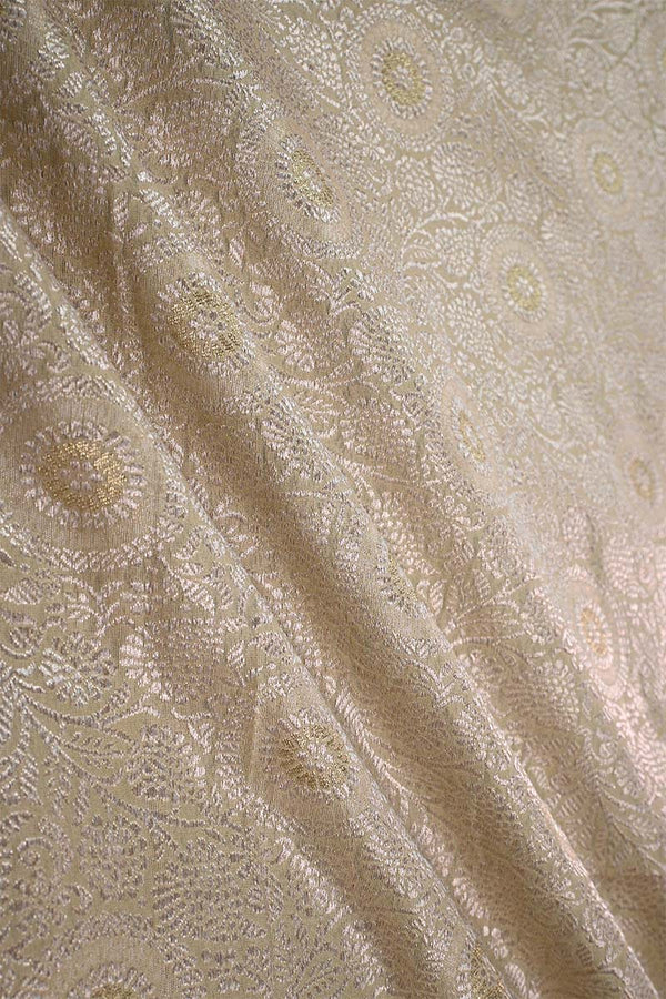 Off white Banarasi silk brocade fabric in floral pattern