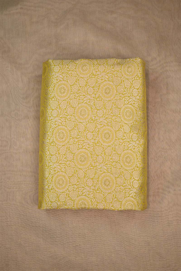 Yellow banarasi silk fabric with intricate floral weaving with beige background