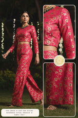 Woman wearing a pink floral traditional outfit with close-up details on fabric and design.