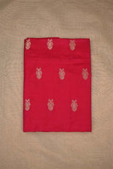Red Banarasi Silk fabric with gold embroidered floral patterns on beige background